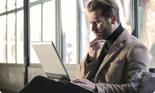 Man looking at the laptop